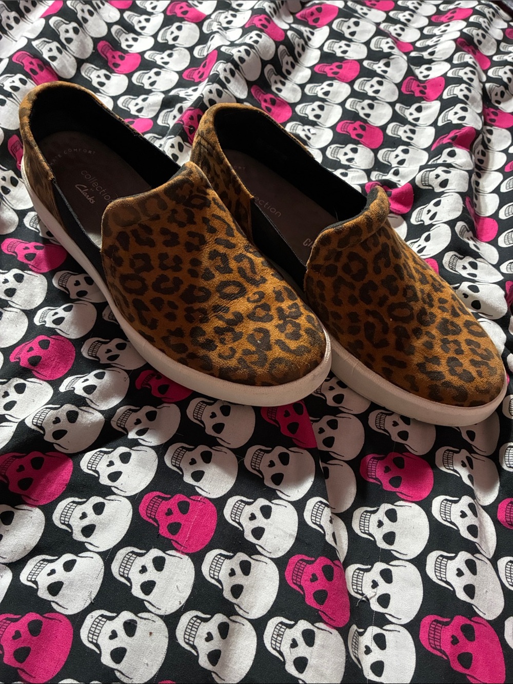 Clark’s cheetah print loafers